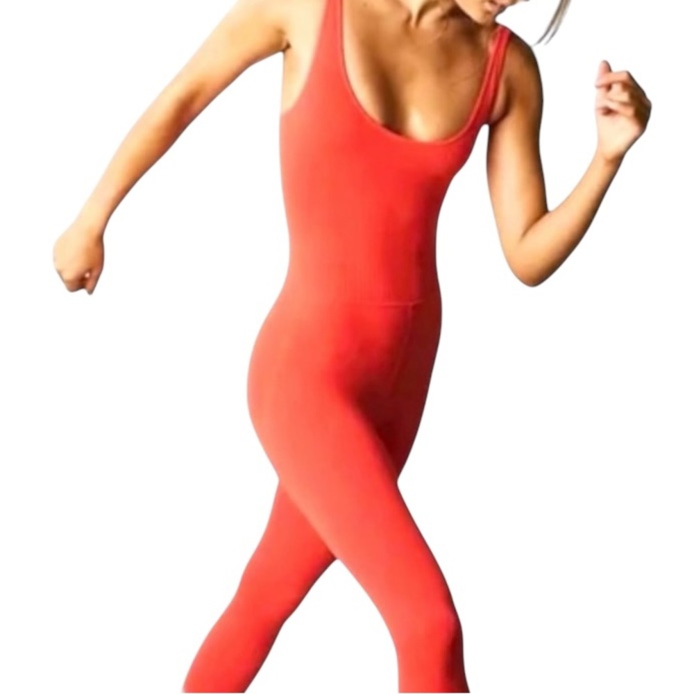 Free People Movement Good Karma
Onesie,leggings,Size M,
Flame colored Orange,NWT